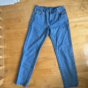Straight cut jeans with hole distress under butt